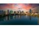 Breathtaking aerial view of the city skyline reflected in a serene lake, capturing the essence of urban tranquility at 401 E Robinson St # 101, Orlando, FL 32801