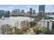 Breathtaking aerial view of downtown skyline, lake, and adjacent neighborhood, showcasing city lifestyle at 401 E Robinson St # 101, Orlando, FL 32801