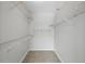 Walk-in closet with white wire shelving, providing ample storage space and organization at 401 E Robinson St # 101, Orlando, FL 32801