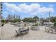 Expansive outdoor patio with dining and lounge areas, offering stunning views of the city skyline at 401 E Robinson St # 101, Orlando, FL 32801