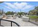 A spacious patio area with tables and chairs offers an outdoor area with city views at 401 E Robinson St # 101, Orlando, FL 32801