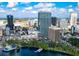 Daytime aerial shot of downtown featuring lakeside views, iconic buildings, and colorful attractions at 401 E Robinson St # 101, Orlando, FL 32801