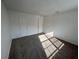 Bright and airy bedroom with carpet floors and natural light at 4154 Versailles Dr # 4154D, Orlando, FL 32808