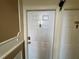 A bright hallway door, number 4154, with hardware and adjacent door at 4154 Versailles Dr # 4154D, Orlando, FL 32808