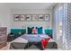 Stylish bedroom with shark-themed decor, creating a fun and vibrant space at 5064 Tana Ter, St Cloud, FL 34772