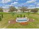Well-manicured Buena Lago community entrance with beautiful landscaping and signage at 5064 Tana Ter, St Cloud, FL 34772