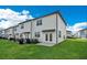 The backyard features a well-maintained lawn and patio at 509 Madison Dr, Davenport, FL 33837