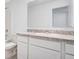 Bathroom with a granite countertop, modern cabinets, and a sink at 509 Madison Dr, Davenport, FL 33837