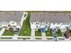 Charming townhomes with well-manicured lawns, driveways, and colorful facades, creating a welcoming curb appeal at 509 Madison Dr, Davenport, FL 33837