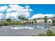 Community pool area with a pool, seating and views of the neighborhood at 509 Madison Dr, Davenport, FL 33837