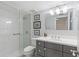 Contemporary bathroom with a walk-in shower, modern vanity, and stylish fixtures at 530 E Central Blvd # 303, Orlando, FL 32801