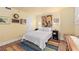 Bedroom with modern decor, colorful rug, and ample natural light at 530 E Central Blvd # 303, Orlando, FL 32801