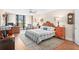 Cozy bedroom with a comfortable bed, balcony access, and stylish furnishings at 530 E Central Blvd # 303, Orlando, FL 32801