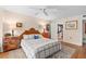 Spacious bedroom with a ceiling fan and walk-in closet at 530 E Central Blvd # 303, Orlando, FL 32801