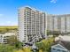 Luxury high-rise building showcasing multiple balconies with stunning city views at 530 E Central Blvd # 303, Orlando, FL 32801