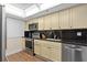 This charming kitchen is equipped with stainless steel appliances and black subway tile backsplash at 530 E Central Blvd # 303, Orlando, FL 32801