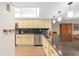 Galley kitchen featuring sleek countertops, modern appliances, and ample cabinet space at 530 E Central Blvd # 303, Orlando, FL 32801
