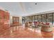 Well-appointed lobby with comfortable seating and a view of the beautifully landscaped outdoor area at 530 E Central Blvd # 303, Orlando, FL 32801
