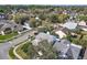 A cozy home nestled in a mature neighborhood showcases a well-maintained lawn and landscaping at 554 Queensbridge Dr, Lake Mary, FL 32746