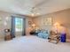 Inviting living room with neutral paint, plush carpet, ceiling fan and an abundance of natural light at 554 Queensbridge Dr, Lake Mary, FL 32746
