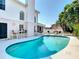 A serene private pool offers a tranquil escape in a beautifully landscaped backyard at 554 Queensbridge Dr, Lake Mary, FL 32746