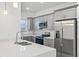 Well-equipped kitchen with stainless steel appliances, ample cabinets, and a stylish faucet at 8015 Sw 133Rd Ln, Ocala, FL 34473