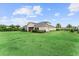 Charming single Gathering home features a large backyard perfect for outdoor entertaining at 8614 Hata St, Orlando, FL 32827