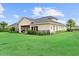 Charming single Gathering home features a large backyard perfect for outdoor entertaining at 8614 Hata St, Orlando, FL 32827