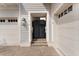 Inviting entry gate with an elegant design leading to a well-maintained garage and home at 8614 Hata St, Orlando, FL 32827