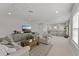 Cozy living room with a media center, plush seating, and a welcoming atmosphere at 8614 Hata St, Orlando, FL 32827