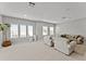 Spacious living room with plush seating, multiple windows and lots of natural light at 8614 Hata St, Orlando, FL 32827