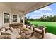 Outdoor patio boasts an expansive view and features comfortable seating and dining area at 8614 Hata St, Orlando, FL 32827