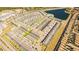 Expansive aerial view highlighting the community's layout, with numerous residences and amenities at 8879 Geneve Ct, Kissimmee, FL 34747