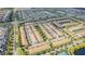 Extensive aerial view of residential neighborhood featuring townhomes and landscaped green spaces at 8879 Geneve Ct, Kissimmee, FL 34747