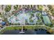 Aerial view of a community pool, lazy river, and basketball court at 8879 Geneve Ct, Kissimmee, FL 34747