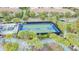Aerial view of the basketball court with a community lazy river at 8879 Geneve Ct, Kissimmee, FL 34747