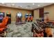 Well-equipped game room features a variety of arcade games and ample space for entertainment at 8879 Geneve Ct, Kissimmee, FL 34747