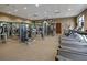 The gym features modern exercise equipment, including weights, treadmills, and stationary bikes for residents at 8879 Geneve Ct, Kissimmee, FL 34747
