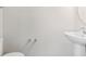 Standard powder room featuring a pedestal sink and chrome hardware at 8879 Geneve Ct, Kissimmee, FL 34747