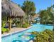 Enjoy a lazy river with tropical landscaping and a waterslide for resort-style living at 8924 Azalea Sands Ln # 8924, Davenport, FL 33896