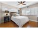 Comfortable bedroom featuring a ceiling fan, natural light, and stylish accents at 111 Autumn Dr, Longwood, FL 32779