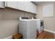 Well-equipped laundry room with modern washer and dryer units at 111 Autumn Dr, Longwood, FL 32779