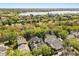 Overhead aerial view of the property with mature trees and solar panels at 11521 Camden Park Dr, Windermere, FL 34786