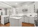 Beautiful kitchen featuring white cabinetry, stainless steel appliances, and a kitchen island at 11521 Camden Park Dr, Windermere, FL 34786