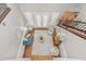 Aerial view of the living room, showcasing the hardwood floors and natural light at 11521 Camden Park Dr, Windermere, FL 34786