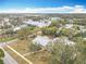 An aerial view of home in neighborhood, close to local businesses at 1510 Live Oak St, New Smyrna Beach, FL 32168