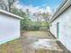 Backyard features space for activities between the main house and the storage shed at 1510 Live Oak St, New Smyrna Beach, FL 32168