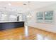 Dining room featuring hardwood floors and natural light from backyard at 1510 Live Oak St, New Smyrna Beach, FL 32168