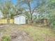 Backyard shed offers additional storage space at 1510 Live Oak St, New Smyrna Beach, FL 32168