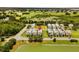 Aerial view of a new neighborhood near a golf course and nature preserve at 1511 Fairview Cir, Kissimmee, FL 34747